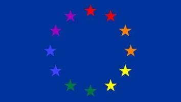 Logo of the ‘Ban on Conversion Practices’ initiative. On a blue background, the 12 starts of the EU Flag are displayed in the different colours of the rainbow.
