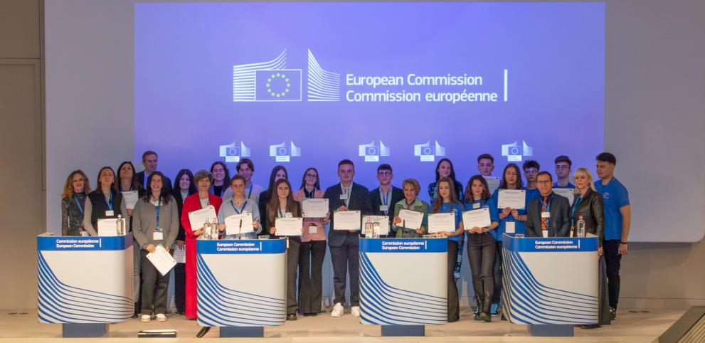 The three winning teams of students with their teachers during the award ceremony in Brussels